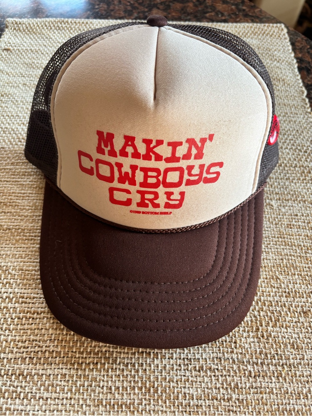 Makin’ Cowboys Cry Trucker Hat